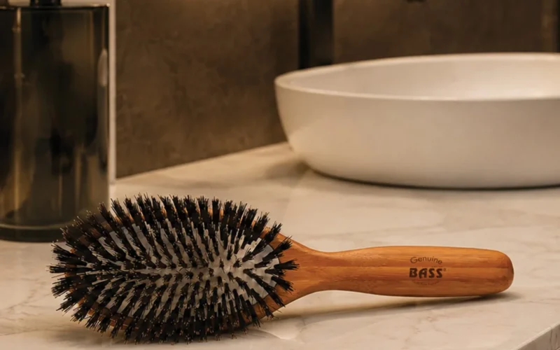 Close-up of boar bristle hairbrush with natural bristles