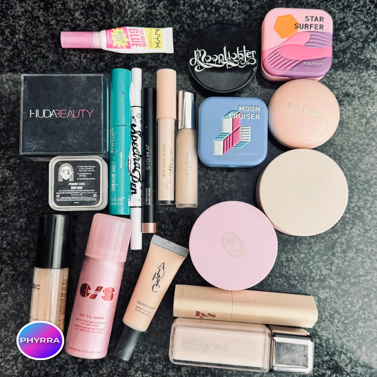 Assorted foundation bottles arranged on a beauty vanity