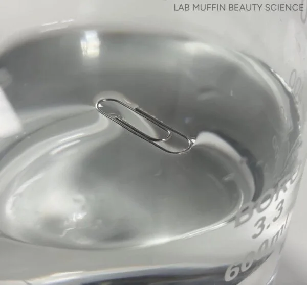 Illustration comparing undamaged versus damaged hair surface tension