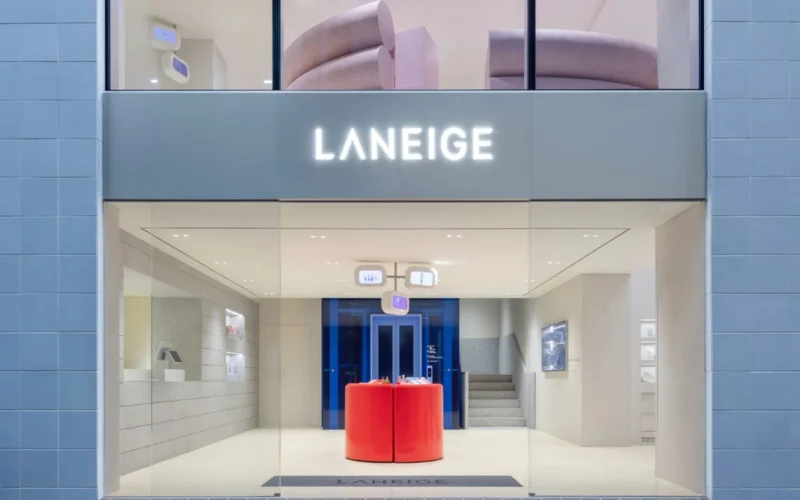 Laneige Seoul flagship facade with red tube sculpture spiraling upward