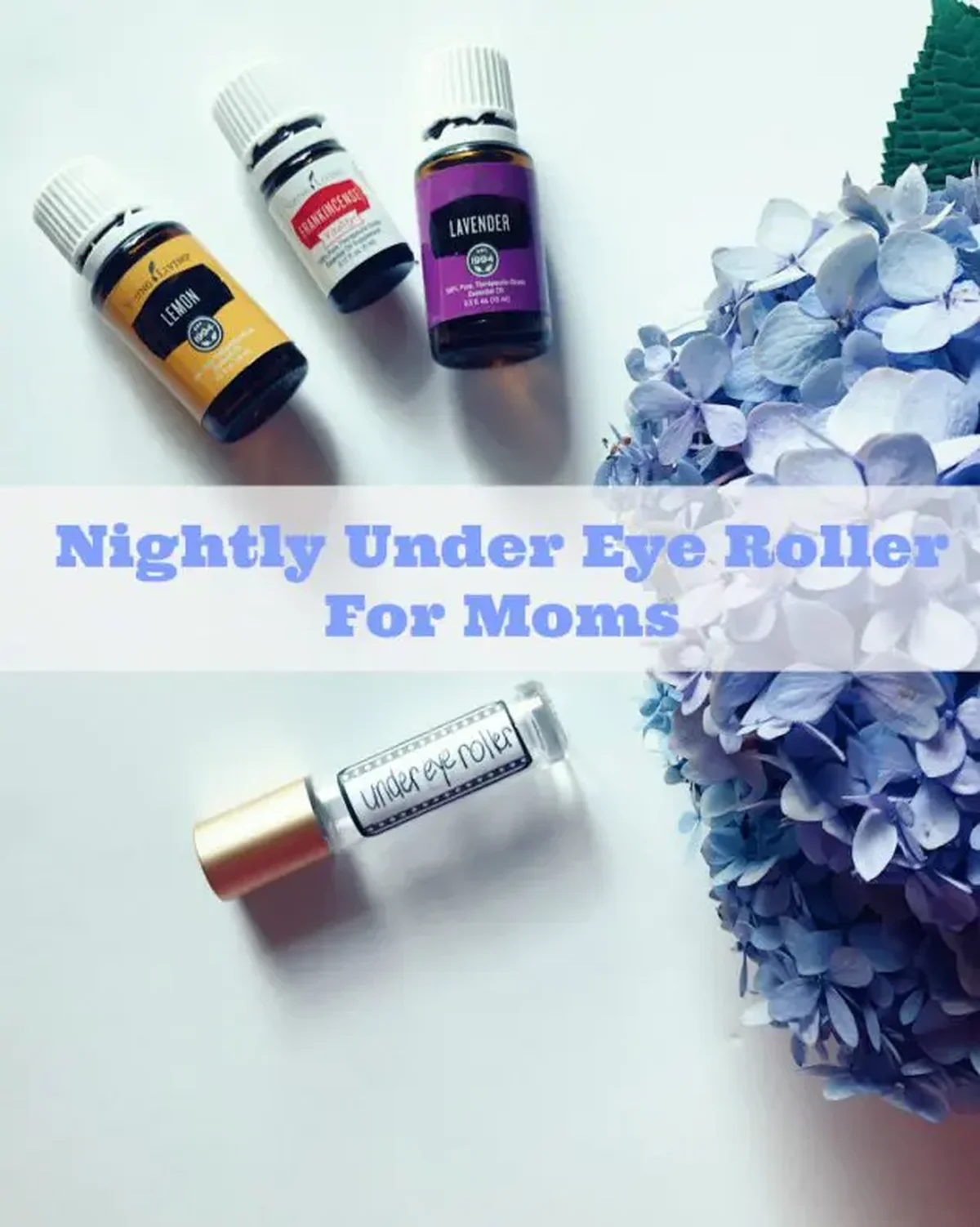Essential oils, roller bottle, and almond oil for under eye treatment