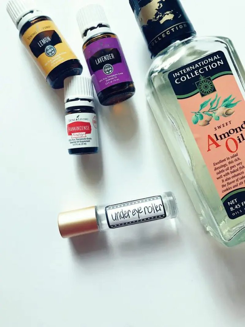 Collection of essential oil bottles and sweet almond oil